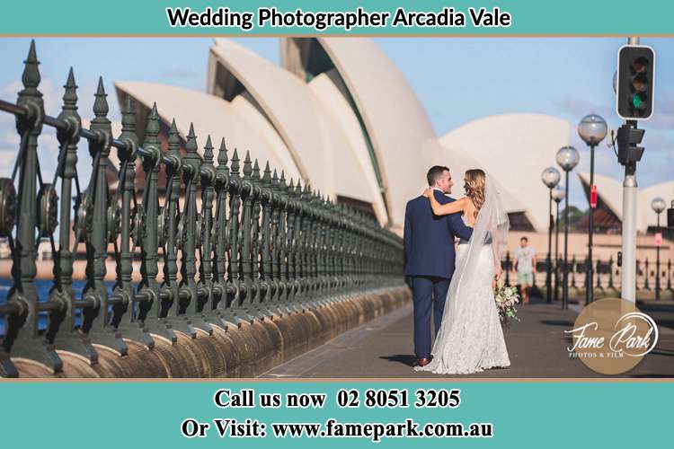 The Groom and the Bride walking towards the Sydney Grand Opera House Arcadia Vale