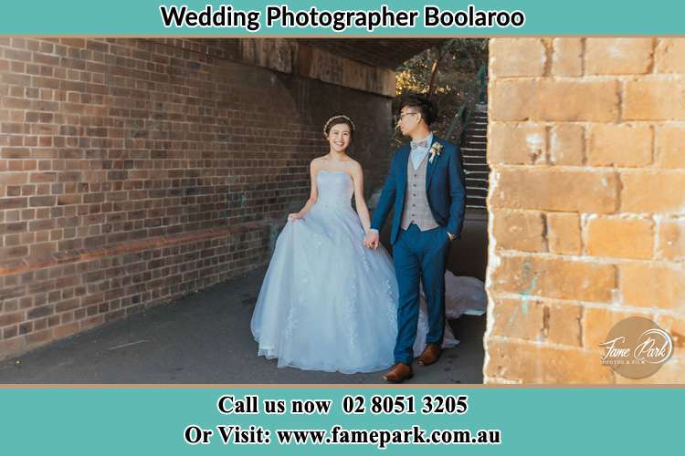 Photo of the Groom and the Bride walks while holding their hands Boolaroo