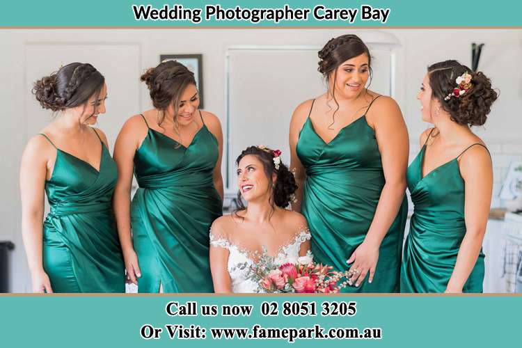 The Bride and her bridesmaids chatting with each other Carey Bay