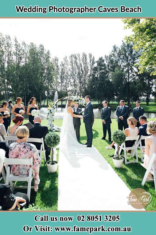 Photo of the Bride and Groom wedding ceremony Caves Beach NSW 2281