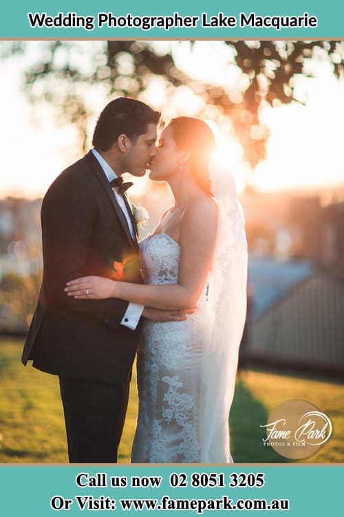 Bride And Groom Kiss Up The Hill Lake Macquarie