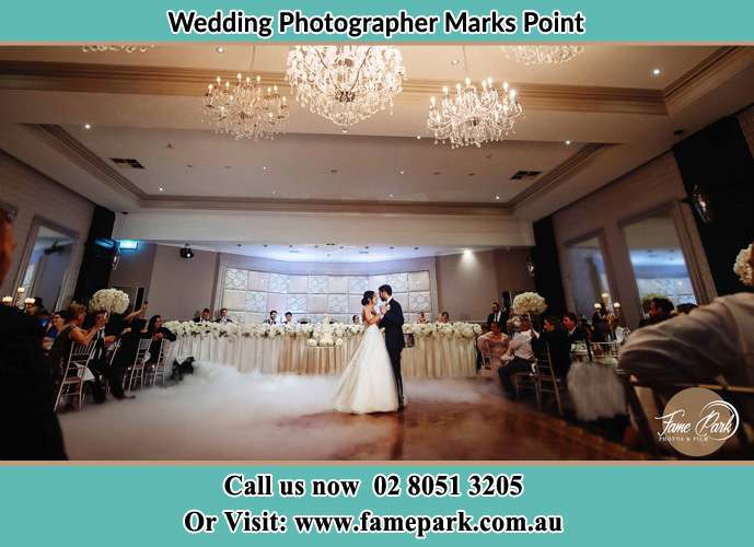 Photo of the Bride and the Groom dancing on the dance floor Marks Point NSW 2280