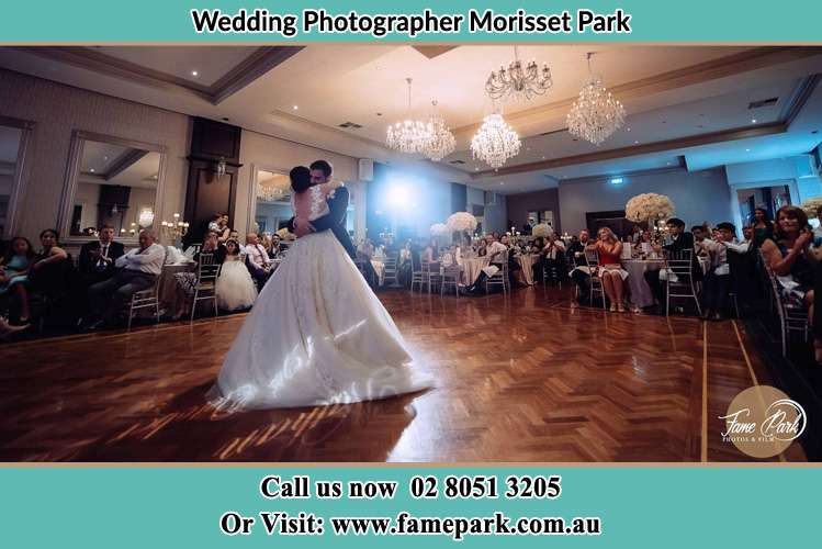 Photo of the Bride and the Groom hugging on the dance floor Morisset Park NSW 2264