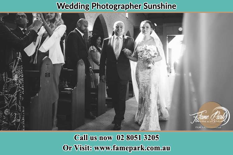 Photo of the Bride with her father walking the aisle Sunshine NSW 2264