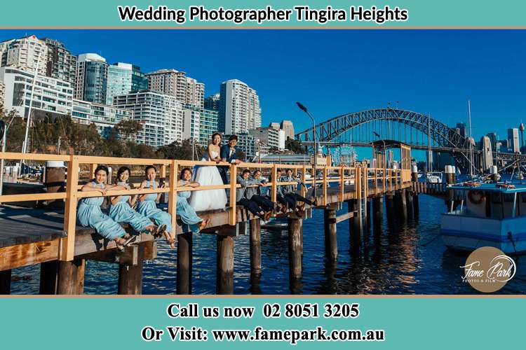 Photo of the Groom and the Bride with the entourage at the bridge Tingira Heights NSW 2290