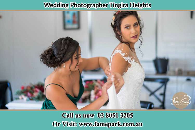 The Bride's gowm being fitted to the Bride Tingira Heights