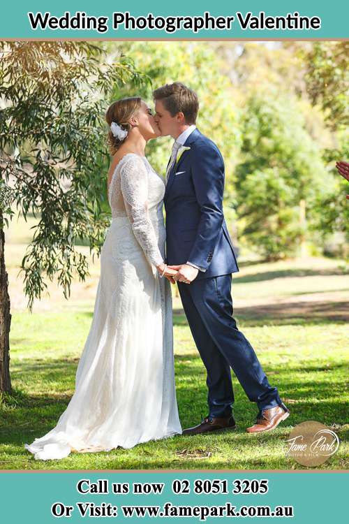 Bride and Groom kissed up the hill Valentine